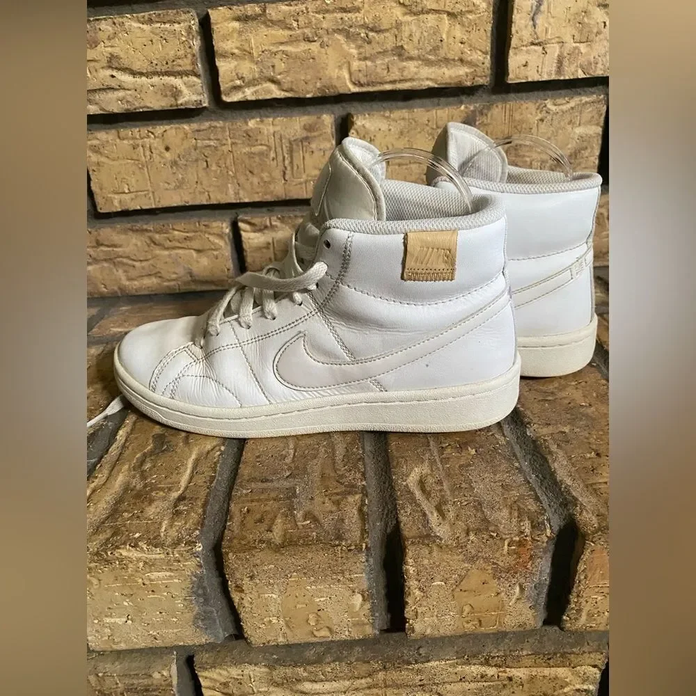 ‎Mid top all white Nike